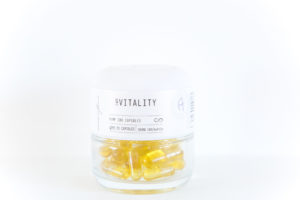 Organic hemp cbd capsules in glass jar for holistic wellness company