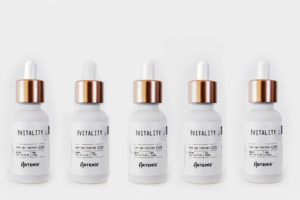 Six organic hemp CBD tinctures for holistic wellness company photographed on white background